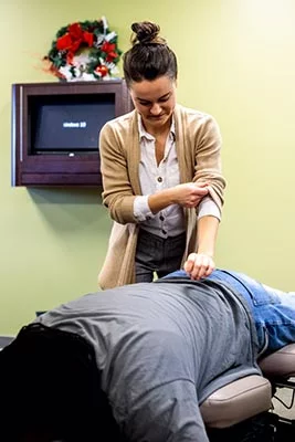 Chiropractor Crown Point IN Kristina Kauffman Beginning an Adjustment