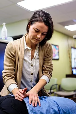 Chiropractor Crown Point IN Kristina Kauffman Focusing on Her Work