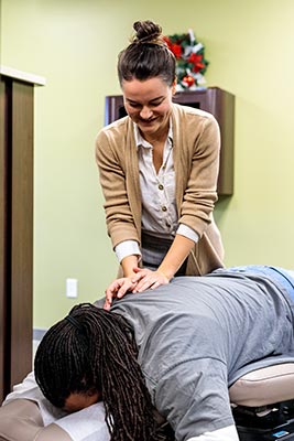 Chiropractor Crown Point IN Kristina Kauffman and Patient