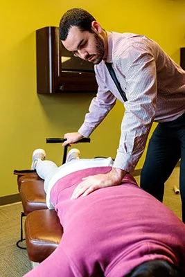 Chiropractor Crown Point IN Michael Kauffman with Patient