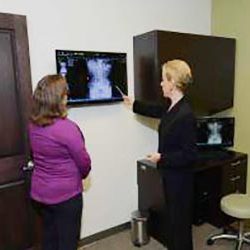 Chiropractor Crown Point IN Danielle Kauffman with Patient Chiropractor Crown Point IN Danielle Kauffman with Patient